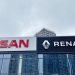 Nissan,Renault,Car,Dealership,Building,With,Large,Glass,Windows,Against