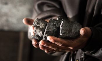 Coal,Mining,:,Coal,Miner,In,The,Man,Hands,Of