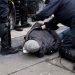 Belgian,Police,Officers,Arrest,Protestors,During,An,Unauthorized,Demonstration,Against