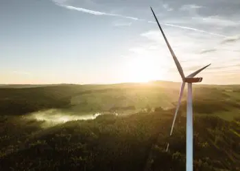 Wind,Turbine,In,The,Sunset,Seen,From,An,Aerial,View