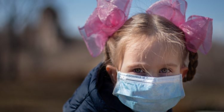 A child in a medical mask during a coronavirus pandemic