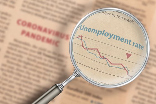 The,Increase,In,Unemployment.,News,In,The,Newspaper,On,The