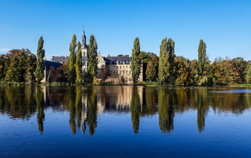 The,Abbey,Of,The,Park,Reflecting,In,The,Pond,In