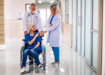Professional,Medical,Doctor,Team,With,Stethoscope,In,Uniform,Discussing,With