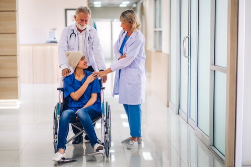 Professional,Medical,Doctor,Team,With,Stethoscope,In,Uniform,Discussing,With