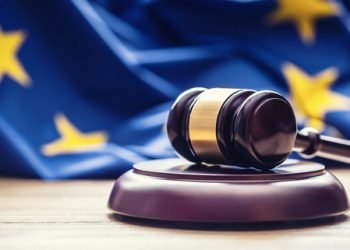 Judges,Wooden,Gavel,With,Eu,Flag,In,The,Background.