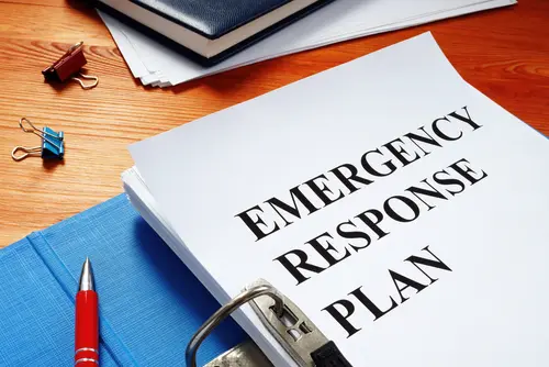 Open,Folder,With,Emergency,Response,Plan.
