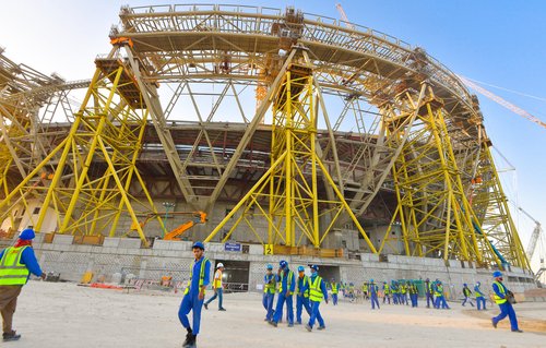 Doha,qatar-feb,15,,2020,:,Workers,Walk,Towards,The,Construction,Site