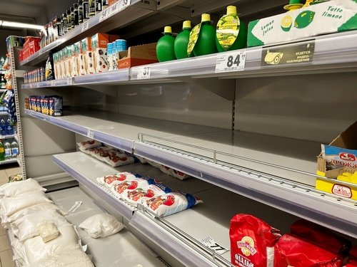 Moscow,,Russia,-,March,8,,2022:,Empty,Shelves,In,Store.