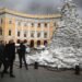 Greek Foreign Minister Nikos Dendias, center, walks with Odessa mayor Gennady Trukhanov in Odesa