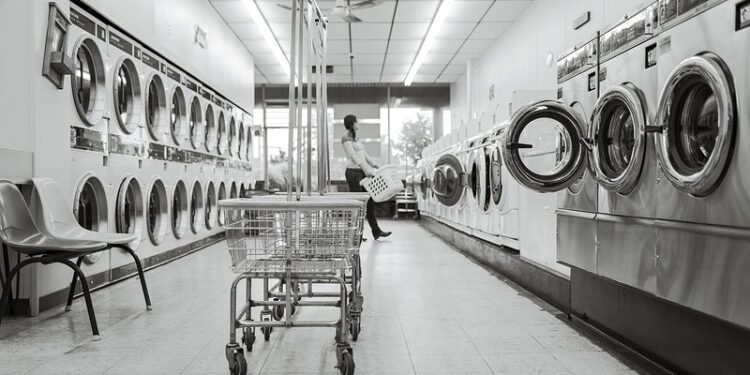 Free washing machine in self service laundry room image, public domain CC0 photo.