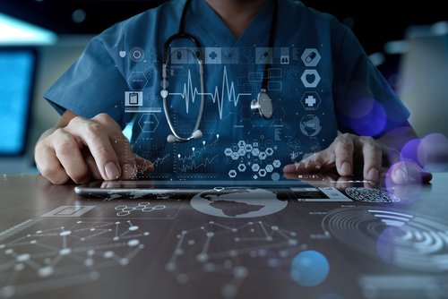 Medicine doctor hand working with modern computer interface as medical network concept