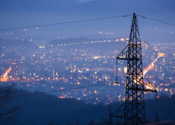 High,Power,Electricity,Poles,In,Urban,Area.,Energy,Supply,,Distribution