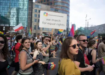 Warsaw, Poland - June 9, 2018: Participants of large Equality Parade - LGBT community pride parade in Warsaw city. Placard "We march for equal rights