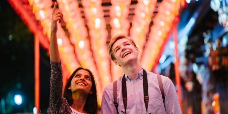 Photo of Man and Woman Looking Up