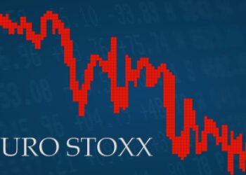 Europe - AUG 2019: The EURO STOXX, a stock market index of the Eurozone is falling. The red graph next to the silver EURO STOXX title on a blue background shows downwards.