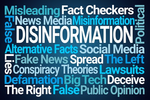 Disinformation Word Cloud on Blue Background