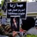 Protestors take part during a demonstration in front of the Iranian embassy in Brussels, Belgium on Sept. 23, 2022, following the death of Mahsa Amini.