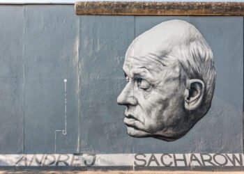 BERLIN, GERMANY - SEPTEMBER 03: Andrei Sacharow pictured by Russian artist Dmitri Vrubel on the Berlin Wall in East Side Gallery on September 03, 2011 in Berlin, Germany, Europe