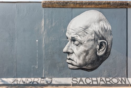 BERLIN, GERMANY - SEPTEMBER 03: Andrei Sacharow pictured by Russian artist Dmitri Vrubel on the Berlin Wall in East Side Gallery on September 03, 2011 in Berlin, Germany, Europe