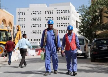 International labour walking in construction side in Qatar