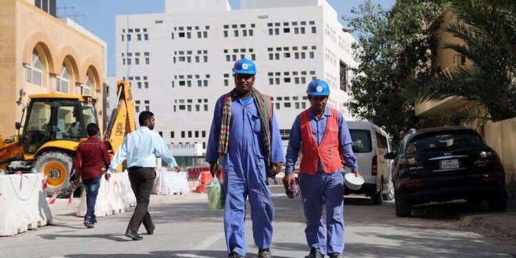 International labour walking in construction side in Qatar