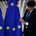 Brussels, Belgium. 28th May 2019.An official adjusts an EU flag in the lobby of the European Council building during the EU Summit.