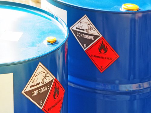 The,Close-up,Shot,Of,Blue,Color,Hazardous,Dangerous,Chemical,Barrels