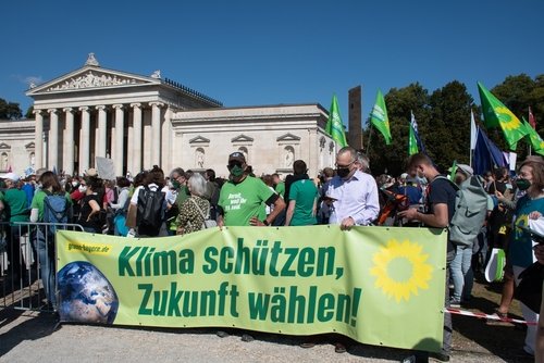 Munich,,Germany,-,September,24,,2021:,Protesters,Holding,A,Banner