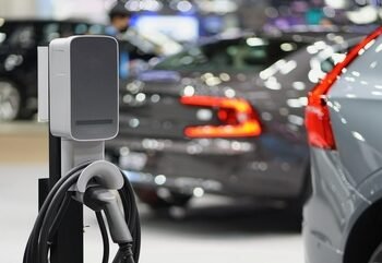 Charging,Electric,Cars,In,Parking,Lots,And,Electric,Vehicle,Charging