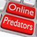 3D illustration of computer keyboard with the print "Online Predators" on two adjacent red buttons