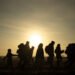 Migrants walk towards the Turkey's Pazarkule border crossing with Greece's Kastanies, in Edirne, Turkey March 1, 2020.