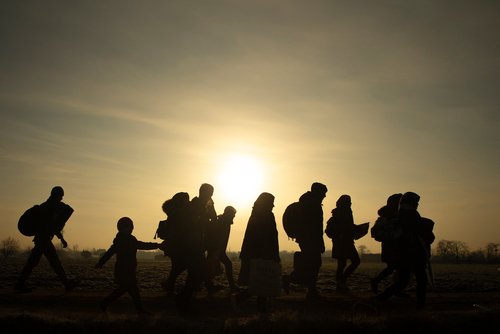 Migrants walk towards the Turkey's Pazarkule border crossing with Greece's Kastanies, in Edirne, Turkey March 1, 2020.