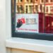 Amsterdam, Netherlands - March 22, 2020: Respect Sex Workers Sign in Red Light District of Amsterdam, Netherlands. People are requested not to film or take photos.