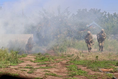 Donezk region, Ukraine - July, 2018: Training of the military unit "Right Sector" in ATO zone on Donbass, Eastern Ukraine. The army on duty near the frontline. Military actions during the war.