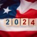 United States presidential election 2024. Wooden cubes with the letters 2024 on the American flag background. Politics and voting conceptual