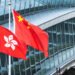 Hong,Kong,And,Mainland,China,National,Flags,Stand,Together,With