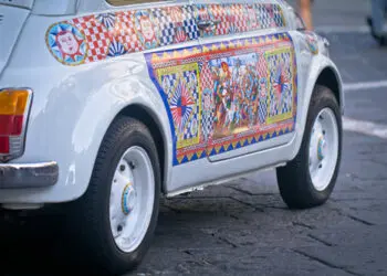 Taormina, Messina / Italy - October 04 2020: Decorated vintage Fiat 500 in Taormina, Sicily, Italy
